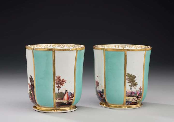 A pair of torquoise ground cachepots with landscapes
